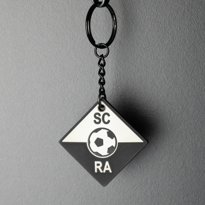 SCRA Schlüsselanhänger